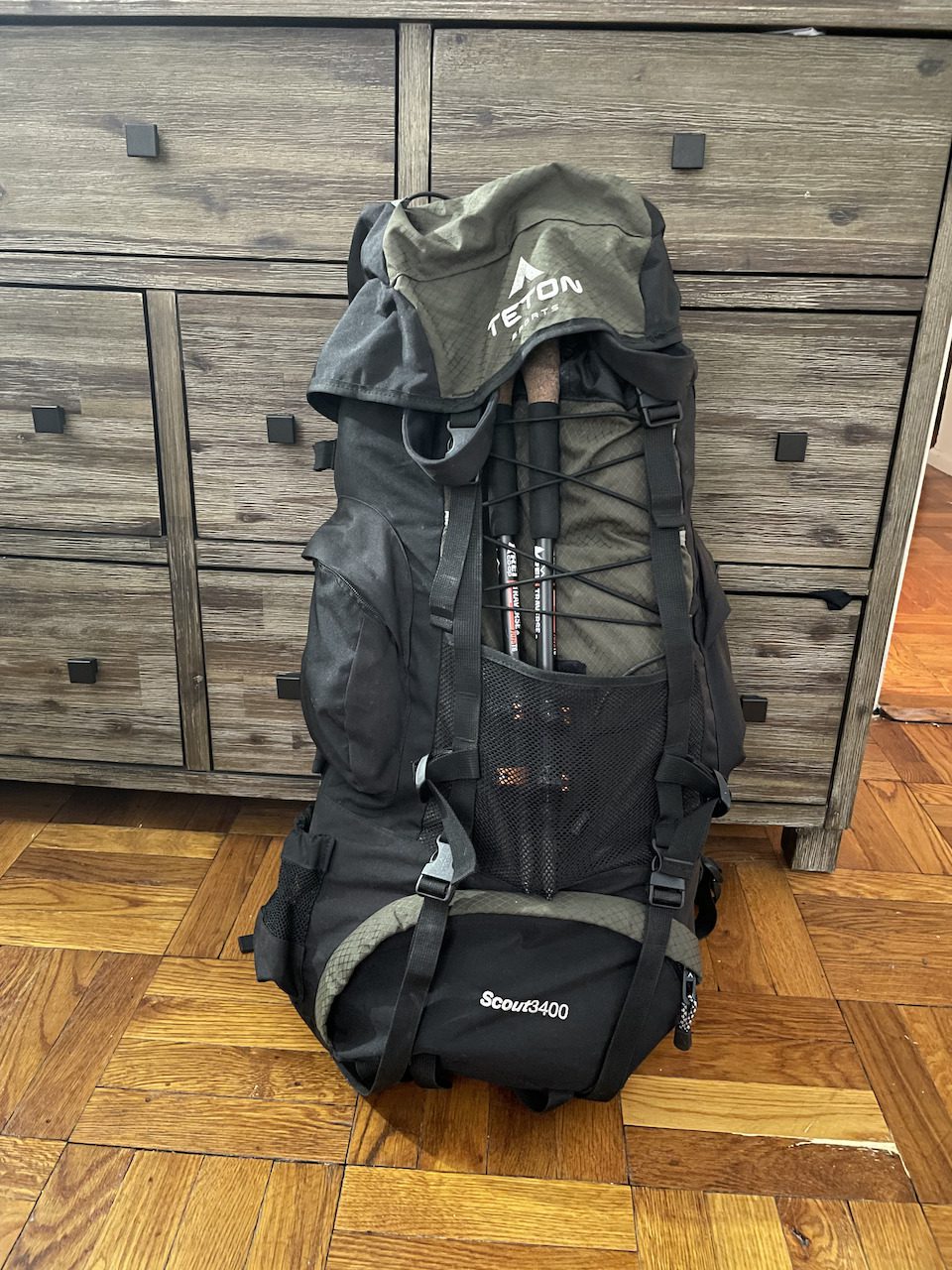 How to Attach Hiking Poles To The Outside Of Your Pack